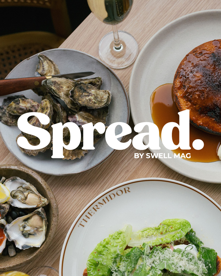 A table spread at Thermidor Oyster Bar and Brasserie featuring fresh oysters, champagne, salad, and a glazed dessert with the headline “Spread by Swell Mag.”